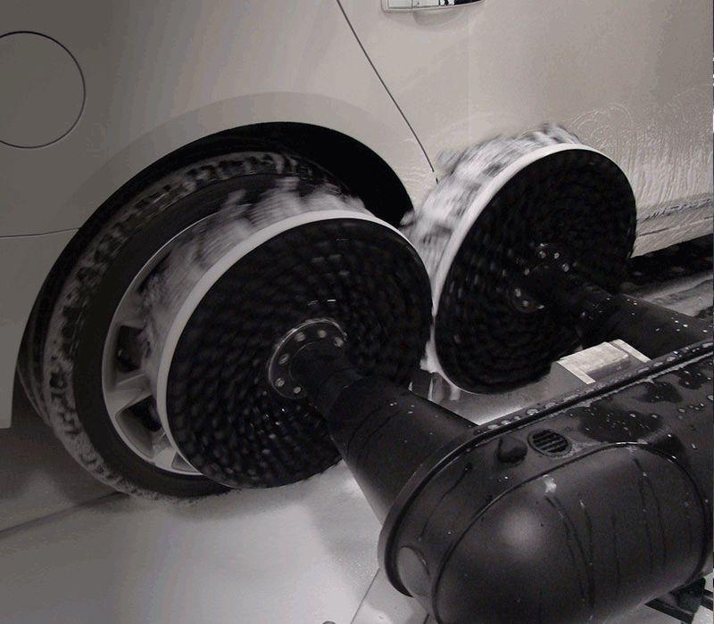 DuoScrubber dual disk wheel and tire cleaner for car wash tunnels.